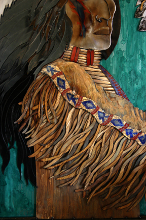 View of layered hair, breastplate and shoulder.