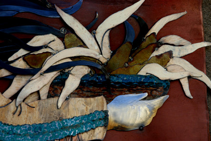 Hair flowing details; close up of Corn Basket; hair intertwining with fringe.