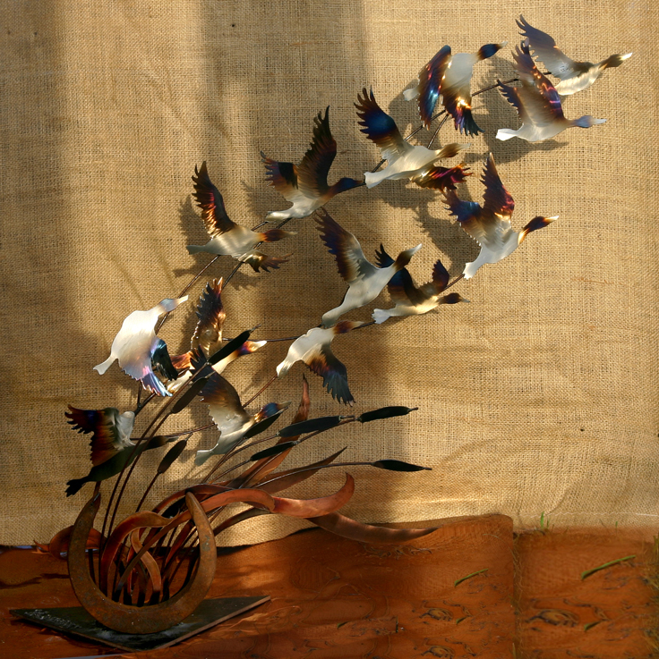 Duck Flight with Horseshoe catttails
30