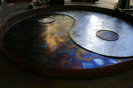 An angle shot to show the yin yang INSIDE the wheel, framed by the Rim.