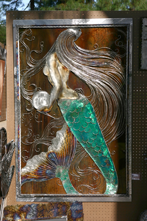 The mermaid captured so much attention, with full light to enhance her deep new patina work and new etched frame.